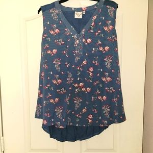Blue high low sleeveless blouse